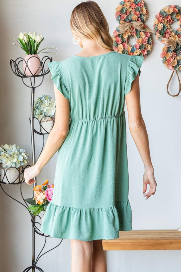 Heimish Full Size Short Sleeve V Neck Ruffled Hem Dress in green with feminine design and playful hem.