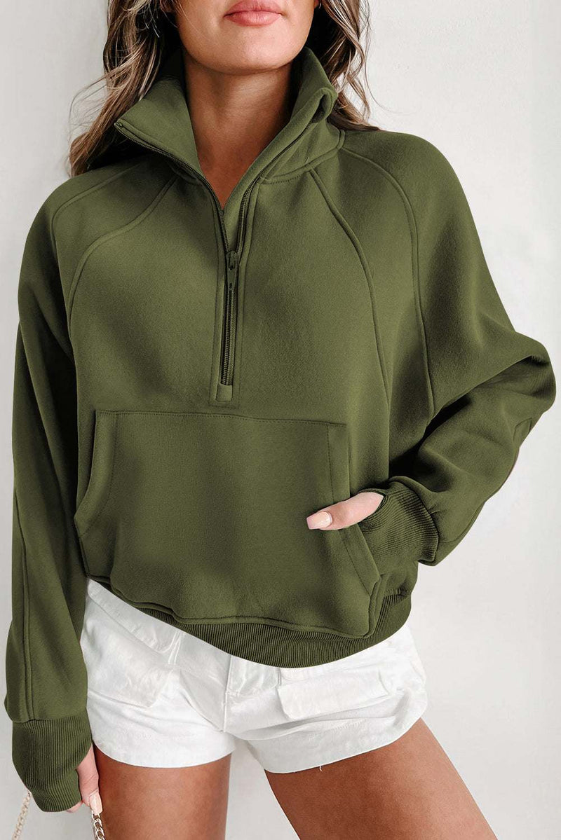 Fleece lined stand collar thumbhole sleeve sweatshirt with zip up design.