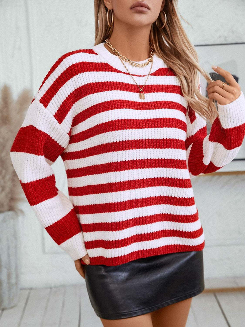 Red and white striped round neck long sleeve sweater.