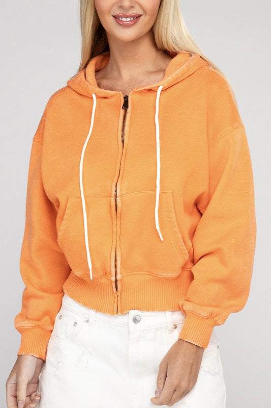 Orange acid wash fleece cropped zip-up hoodie with drawstring hood and pockets.