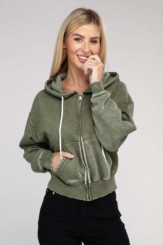 Acid wash fleece cropped zip-up hoodie with drawstring hood and pockets.