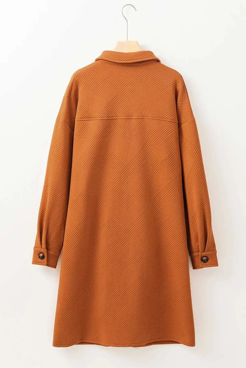 Textured button down collared neck coat in brown with button cuffs, shown from the back.