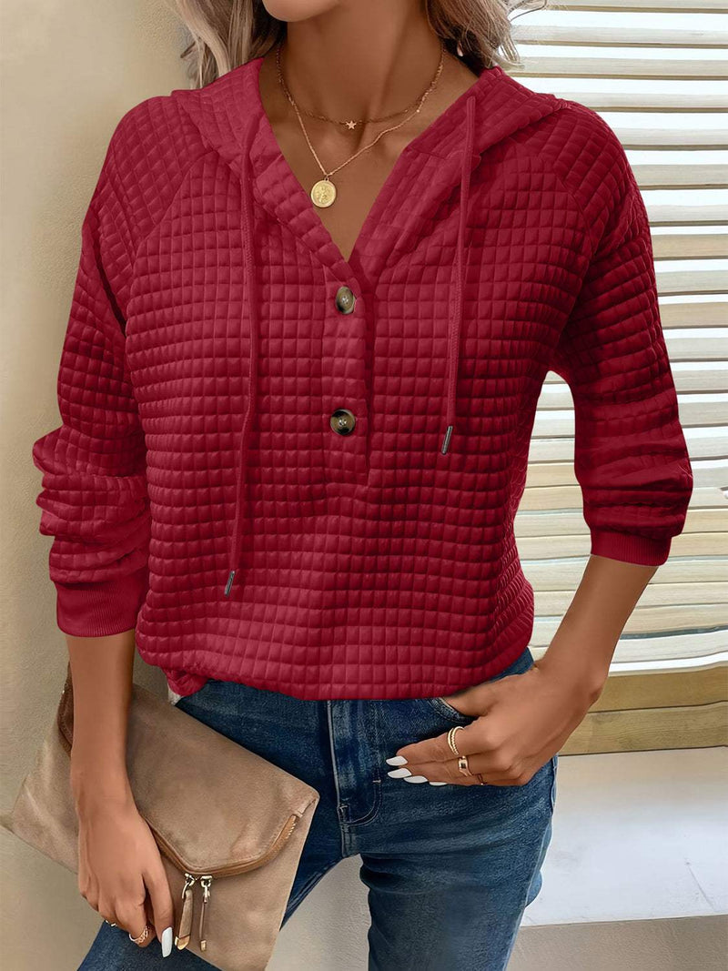 Full size texture button detail drawstring long sleeve hoodie in red.