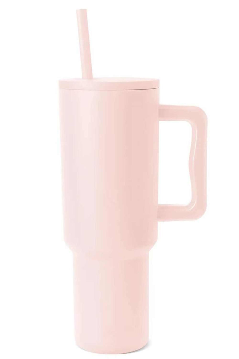 Monochromatic stainless steel tumbler with matching straw and handle.