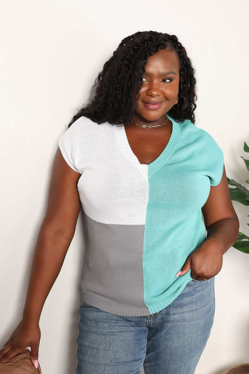Color Block V-Neck Knit Top with short sleeves and modern design.