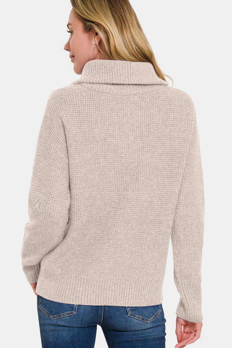 Zenana Half Zip Long Sleeve Sweater in beige, back view, showcasing ribbed texture and long sleeves.