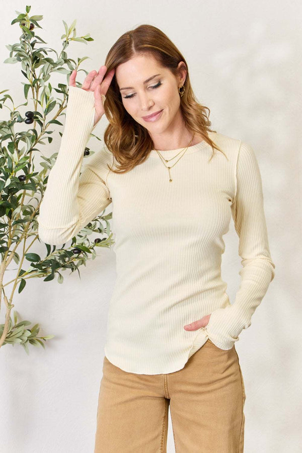 Culture Code Full Size Ribbed Round Neck Long Sleeve Top in cream color worn by a model.