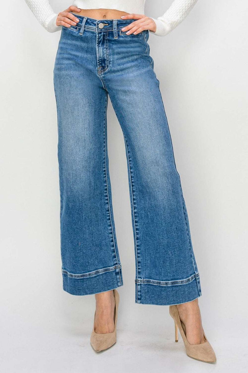 RISEN full size high rise wide leg jeans with raw hem and pockets.