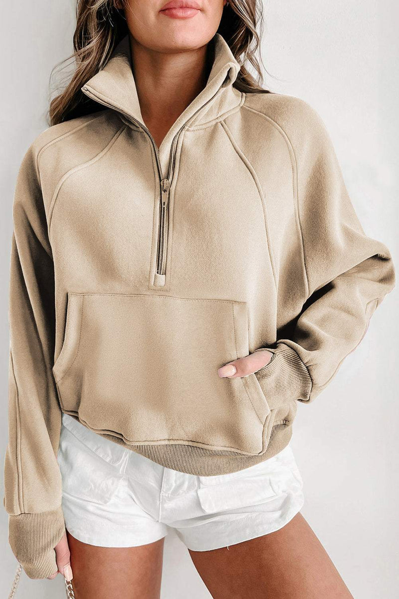 Fleece lined zip up stand collar sweatshirt with thumbhole sleeves.