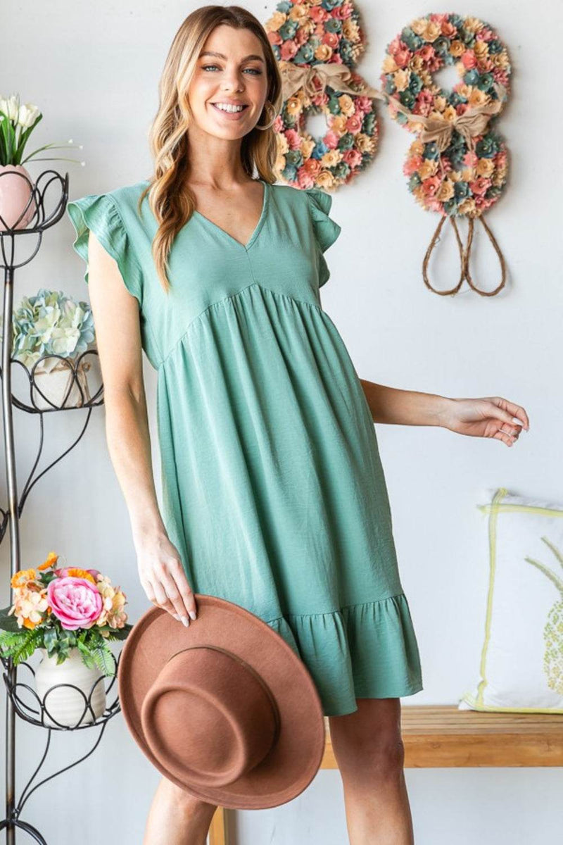 Heimish full size short sleeve v neck ruffled hem dress with elegant design.