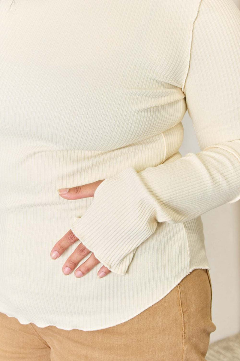 Culture Code full-size ribbed round neck long sleeve top in cream with elongated sleeves and frill details.