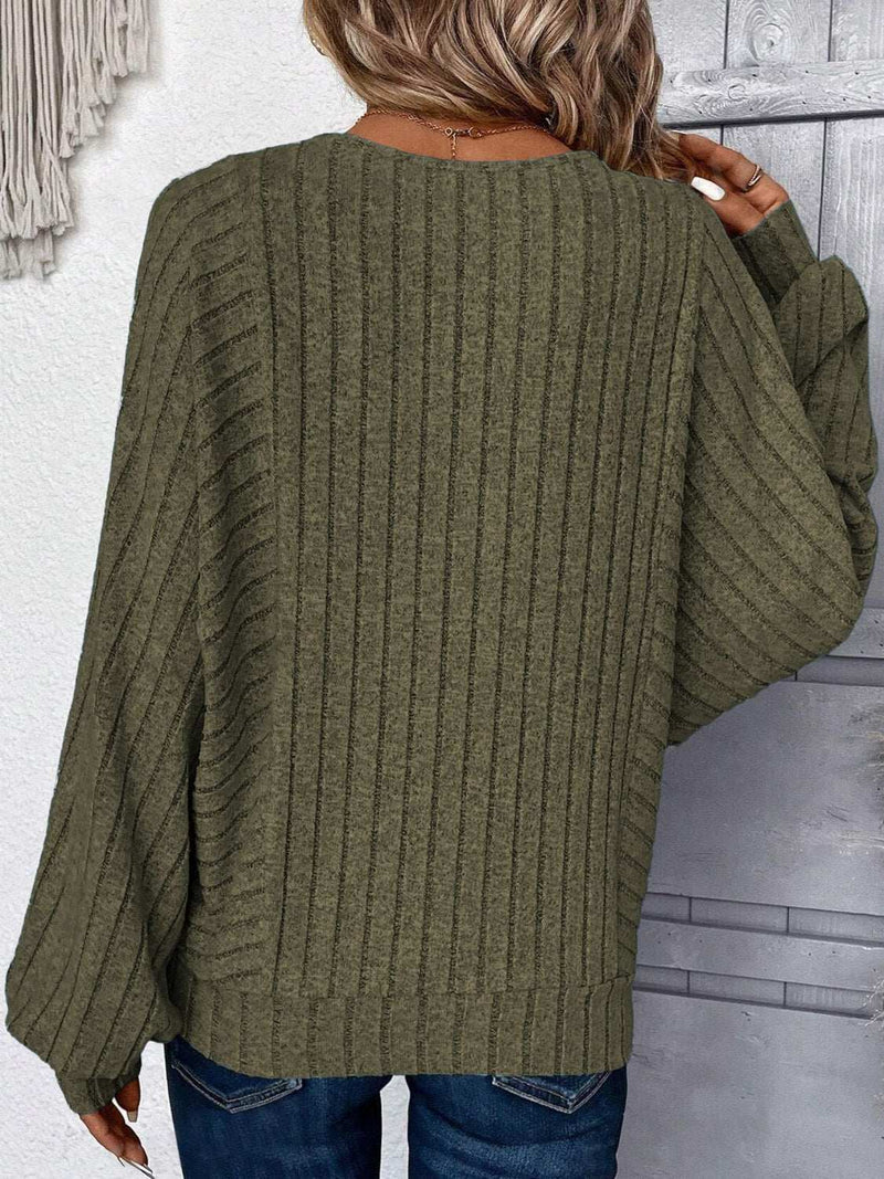 Plus size round neck batwing sleeve T-shirt in green with ribbed texture.