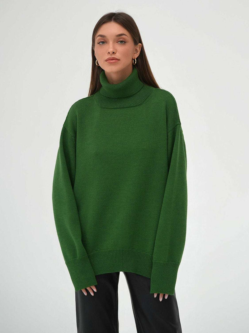 Green turtleneck long sleeve sweater made of viscose, polyester, and nylon.