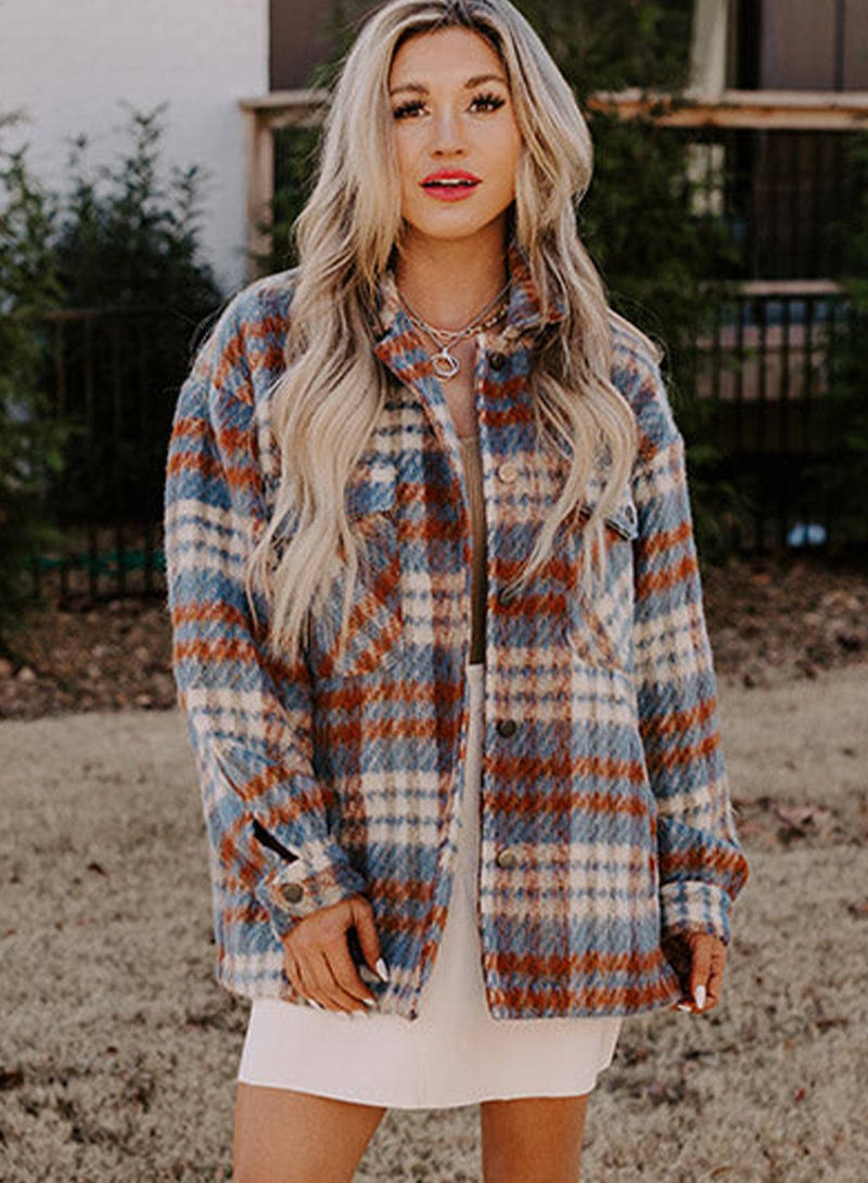 Cinnamon plaid print shacket with chest pockets and turn-down collar.