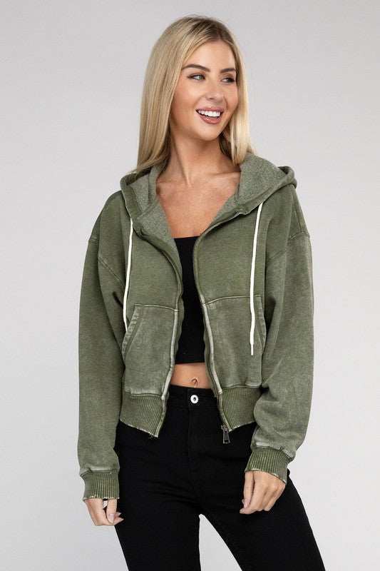 Acid Wash Fleece Cropped Zip-Up Hoodie with pockets and drawstring hood in green, worn by a model.
