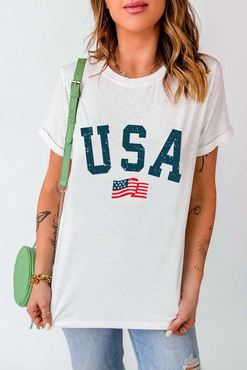 USA Round Neck Short Sleeve T-ShirtFeatures: Basic style
Sheer: Opaque
Stretch: Slightly stretchy
Material composition: 62% polyester, 32% cotton, 6% elastane
Care instructions: Machine wash cold. TumAll TopsTrendsiKlondike Creek Unique BoutiqueUSA Round Neck Short Sleeve