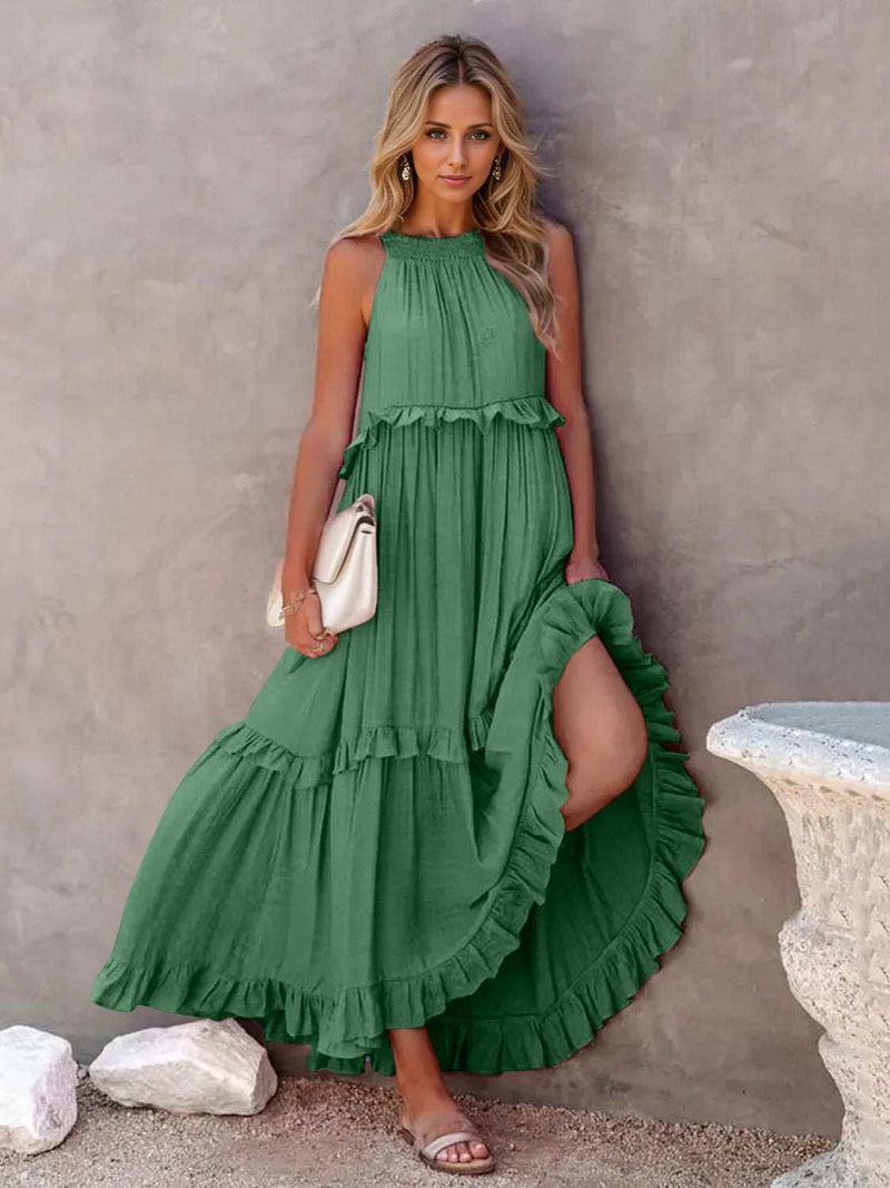Emerald green ruffled sleeveless tiered maxi dress with pockets.