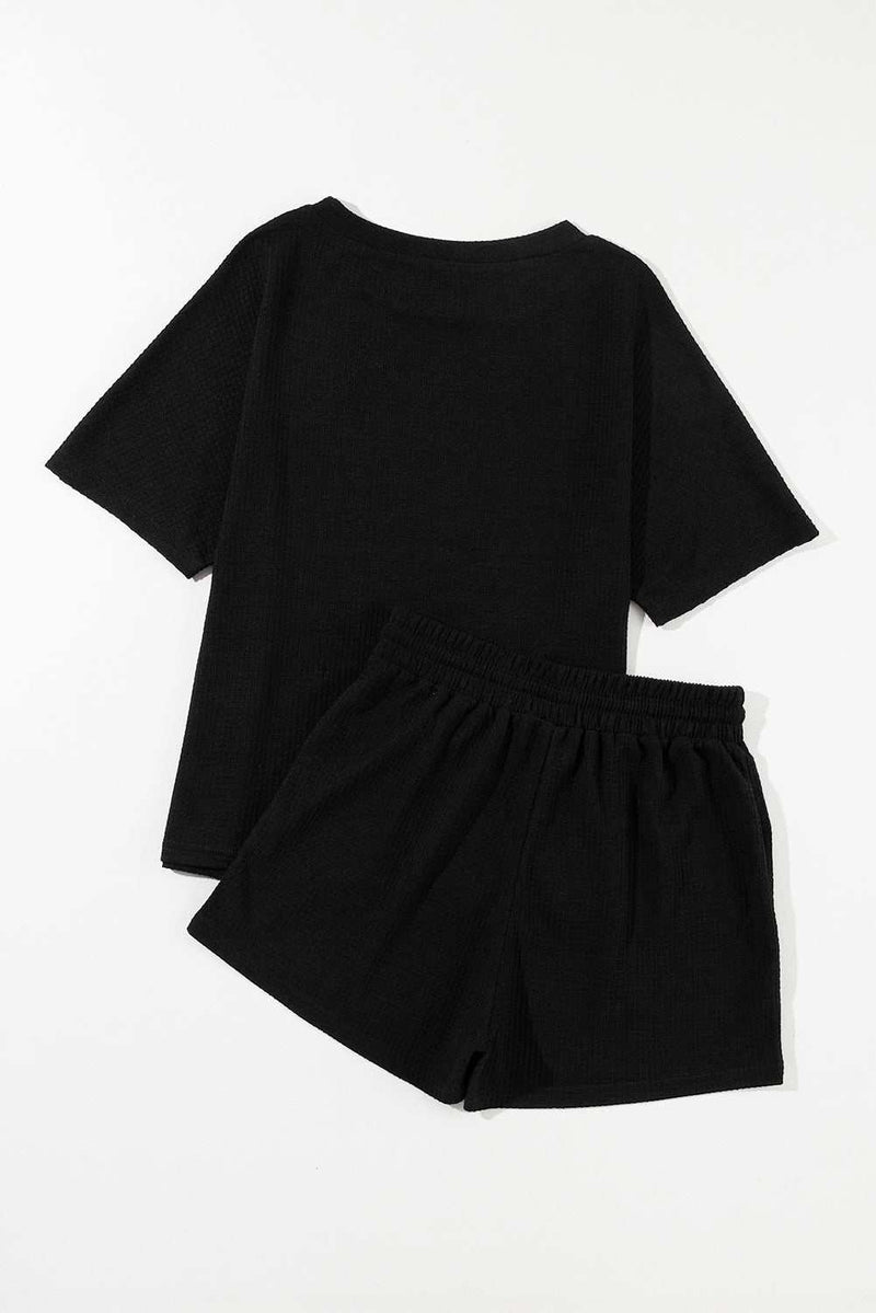 Round Neck Short Sleeve Top and Drawstring Shorts SetFeatures: Drawstring
Number of pieces: Two-piece
Stretch: Slightly stretchy
Material composition: 75% polyester, 25% viscose
Care instructions: Machine wash cold. TuAll TopsTrendsiKlondike Creek Unique BoutiqueRound Neck Short Sleeve Top