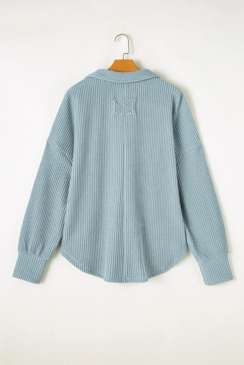 Plus size textured long sleeve sweatshirt with Johnny collar in light blue.