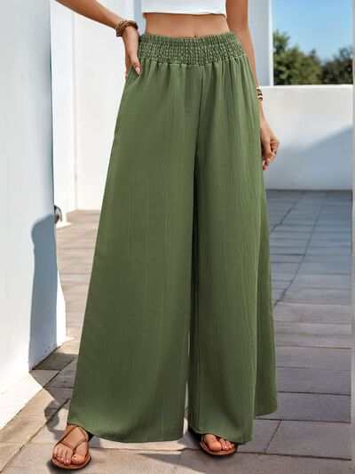 Perfee Smocked Wide Leg Pants in green, featuring smocked waist and pockets.