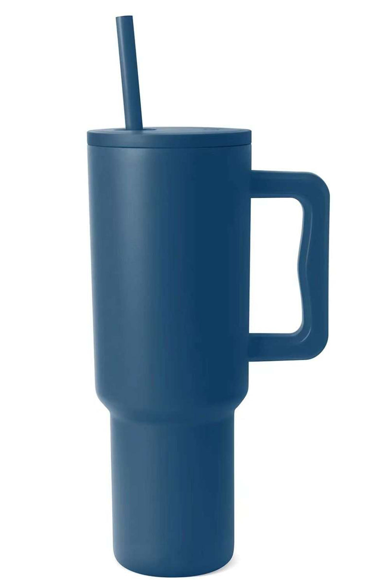 Monochromatic stainless steel tumbler with matching straw and handle.