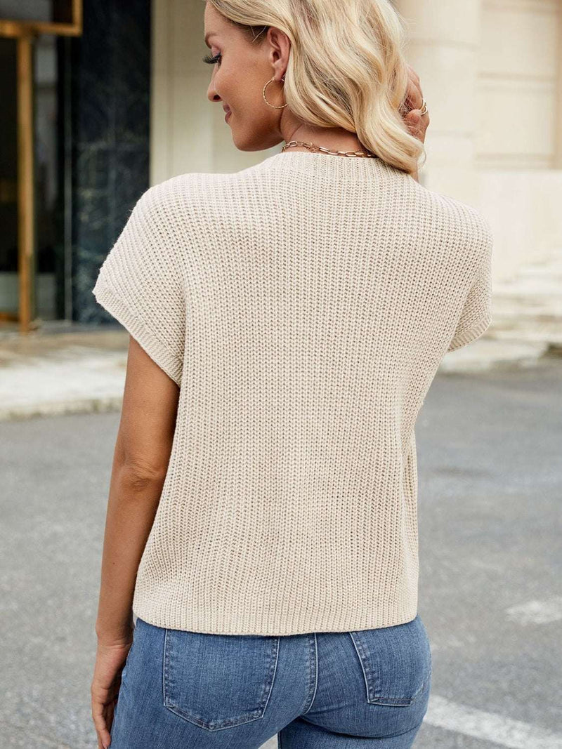 Round Neck Short Sleeve Sweater with pockets, slightly stretchy acrylic material, back view.
