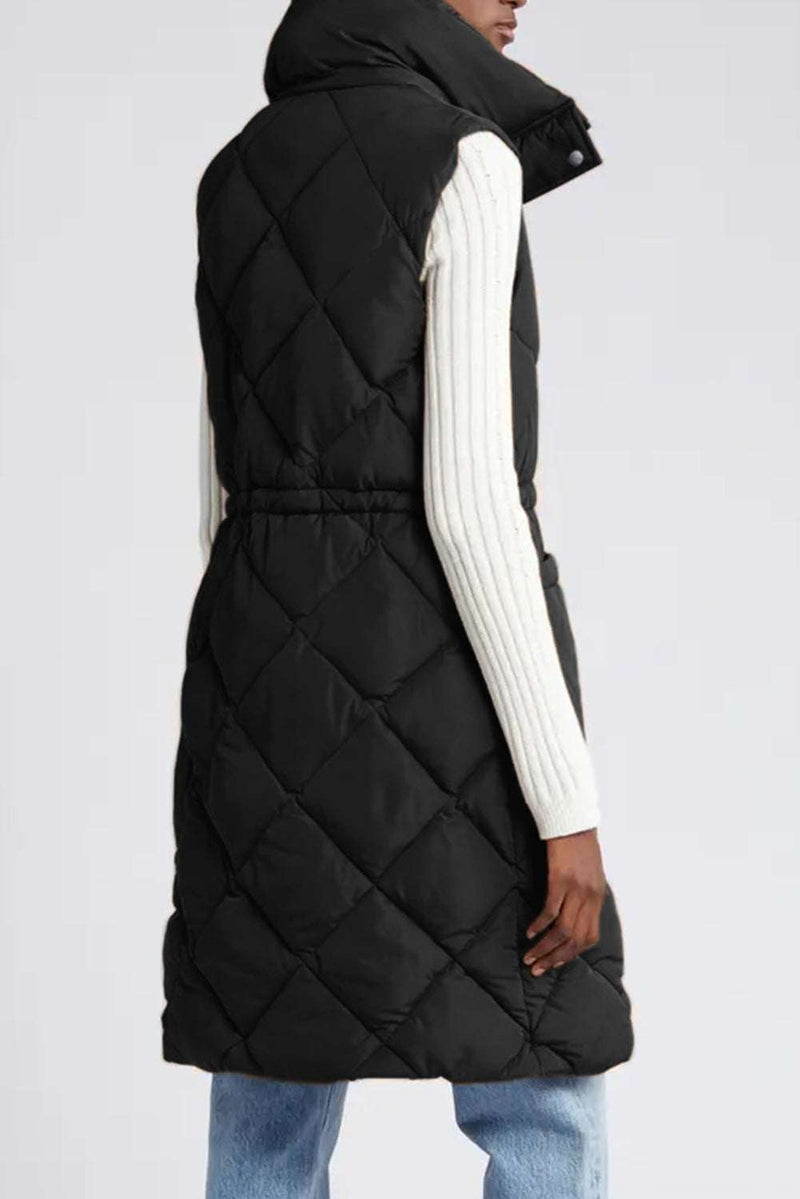 Coffee Longline Quilted Stand Collar Puffer VestStay warm and stylish with our Coffee Longline Quilted Stand Collar Puffer Vest. Perfect for chilly days, this vest is a must-have addition to your wardrobe.



QuilOuterwear/VestsKlondike Creek Unique BoutiqueKlondike Creek Unique BoutiqueCoffee Longline Quilted Stand Collar Puffer Vest