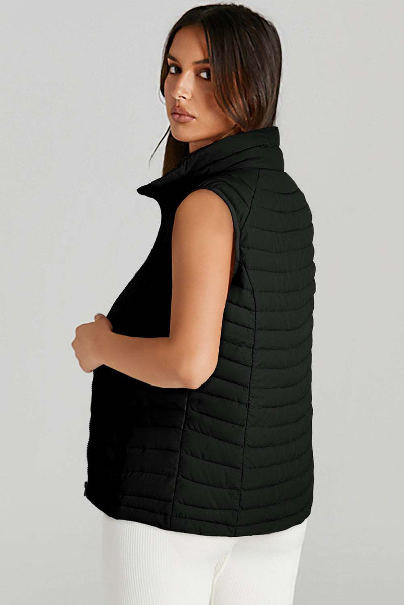 Black Plush Collared Quilted Zipped Puffer VestIntroducing our Black Plush Collared Quilted Zipped Puffer Vest - the perfect blend of comfort and chic! Designed for those who love to stay warm without compromisinOuterwear/VestsKlondike Creek Unique BoutiqueKlondike Creek Unique BoutiqueBlack Plush Collared Quilted Zipped Puffer Vest