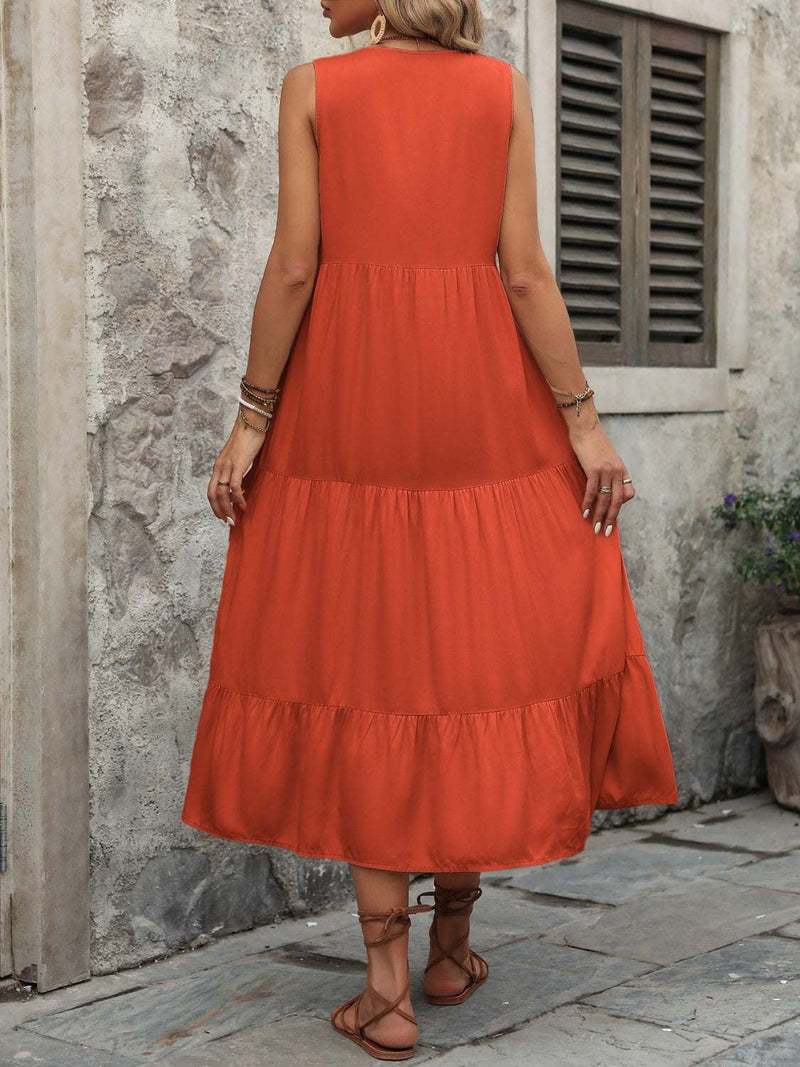 Ivy Lane decorative button notched sleeveless dress in orange cotton.