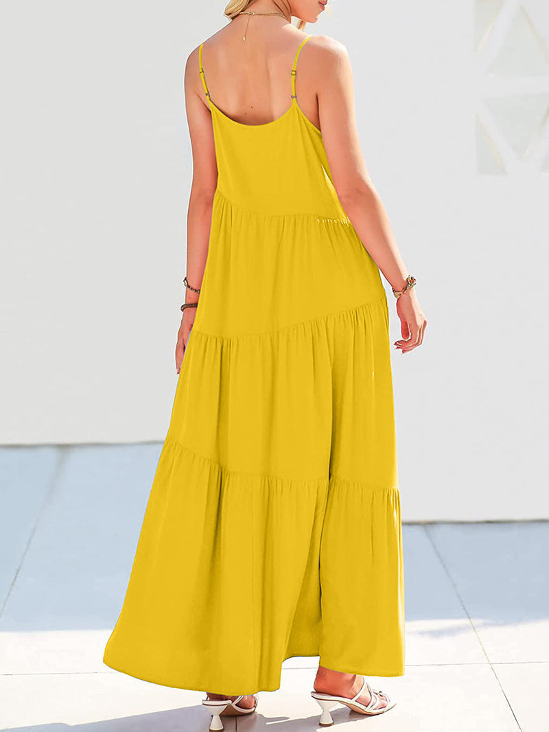 Full Size Ruched Tiered Spaghetti Strap Dress in yellow with moderate stretch and opaque fabric.