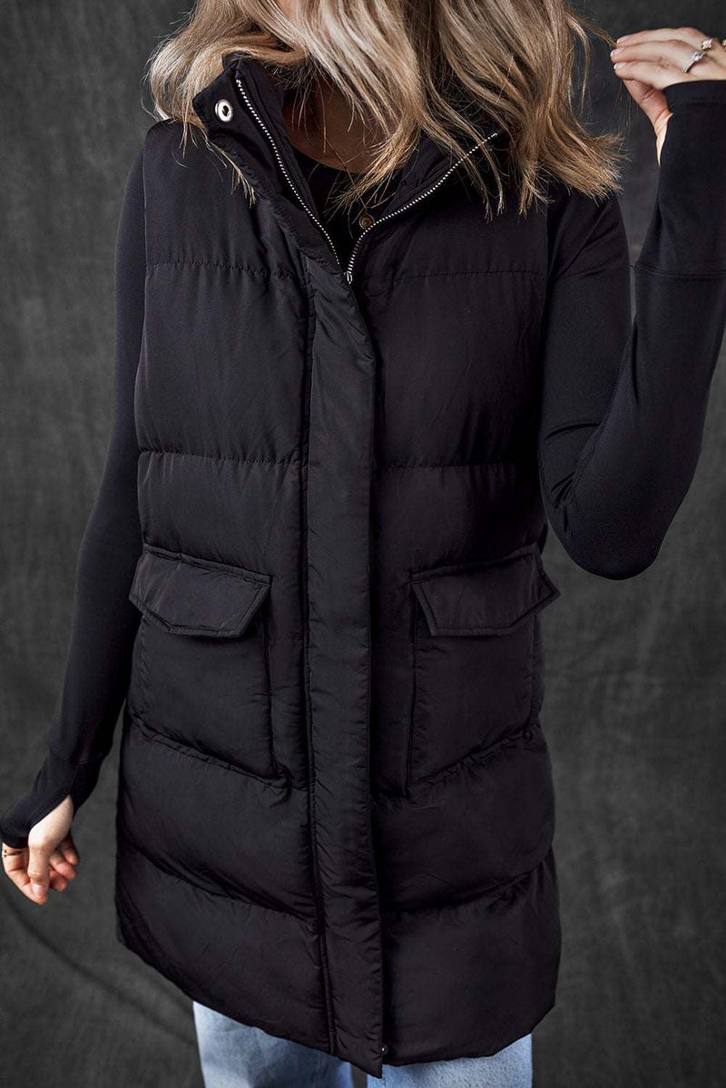 Black windproof longline full zipper puffer vest with pockets.