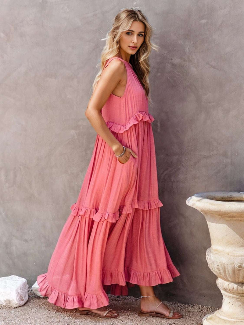 Ruffled Sleeveless Tiered Maxi Dress with Pockets in pink.