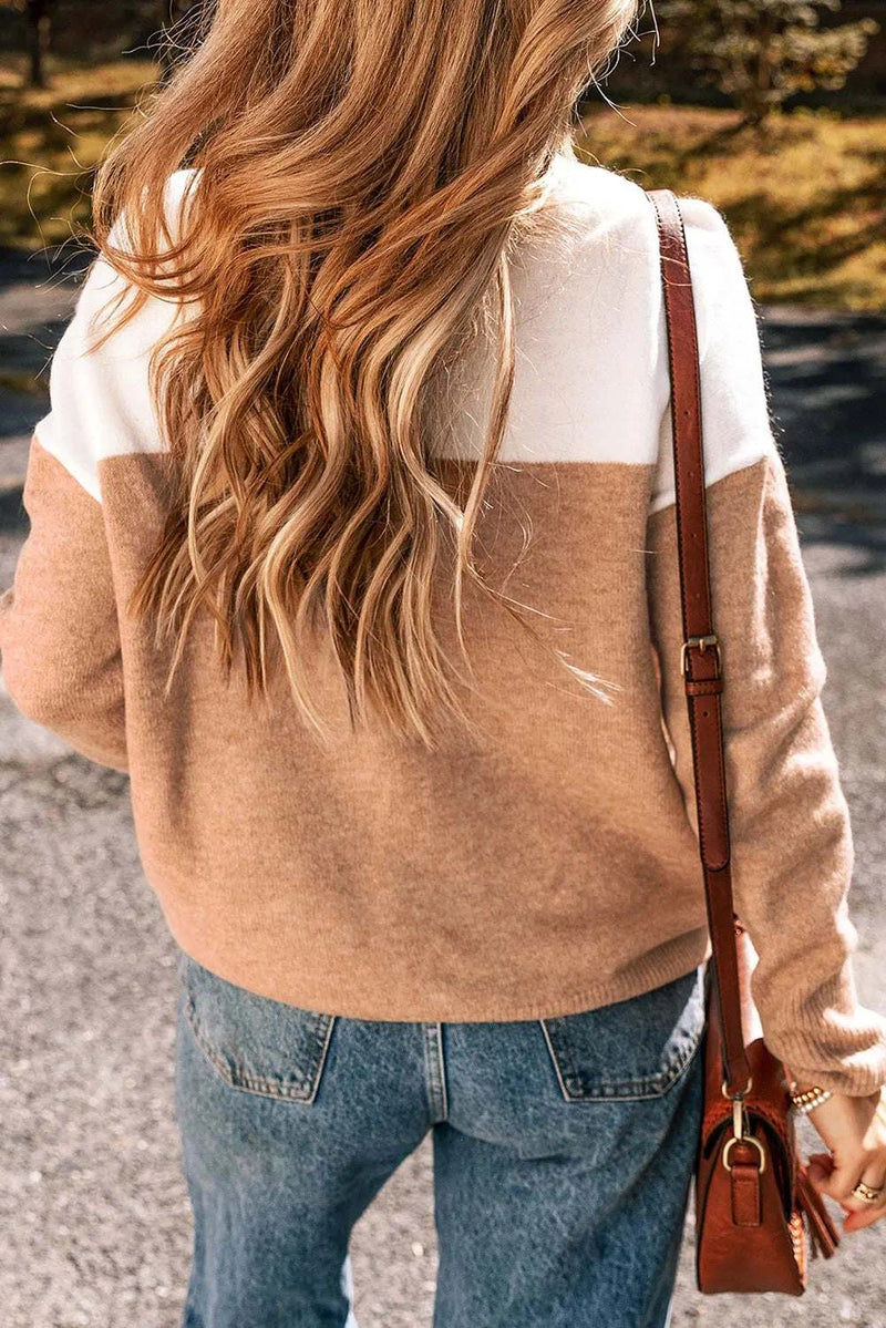 Color block round neck long sleeve sweater with slightly stretchy fabric.