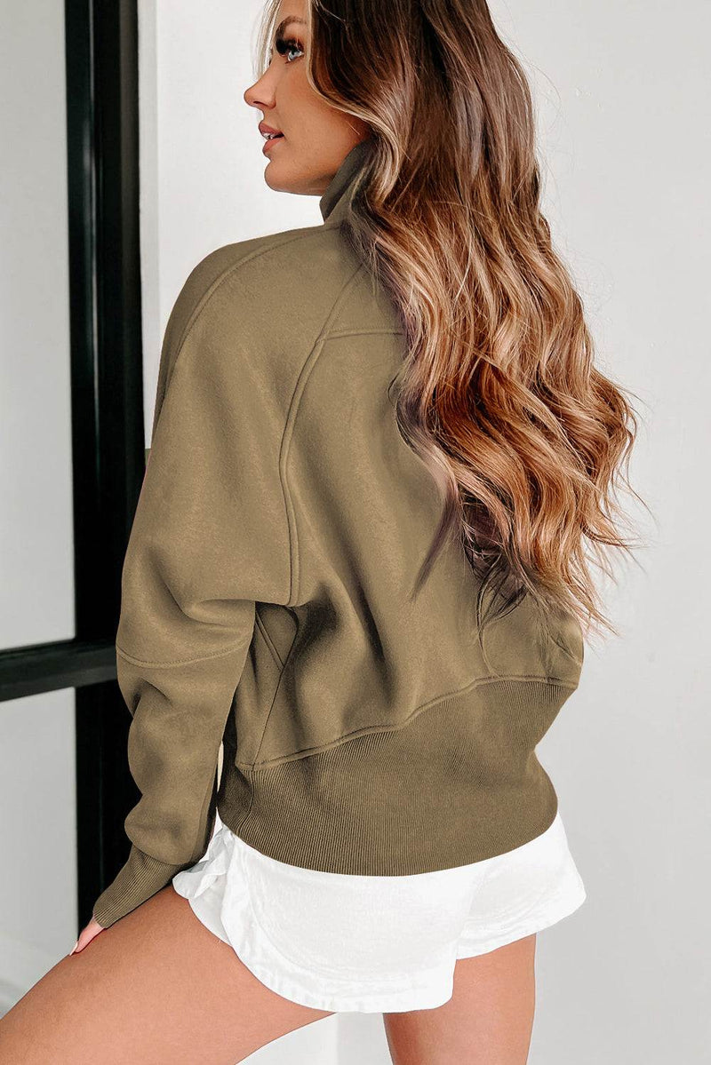 Fleece lined stand collar thumbhole sleeve sweatshirt in brown.