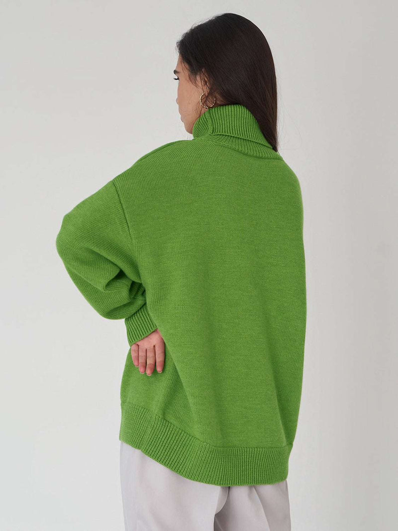 Green turtleneck long sleeve sweater, slightly stretchy, composed of 50% viscose, 30% polyester, 20% nylon.