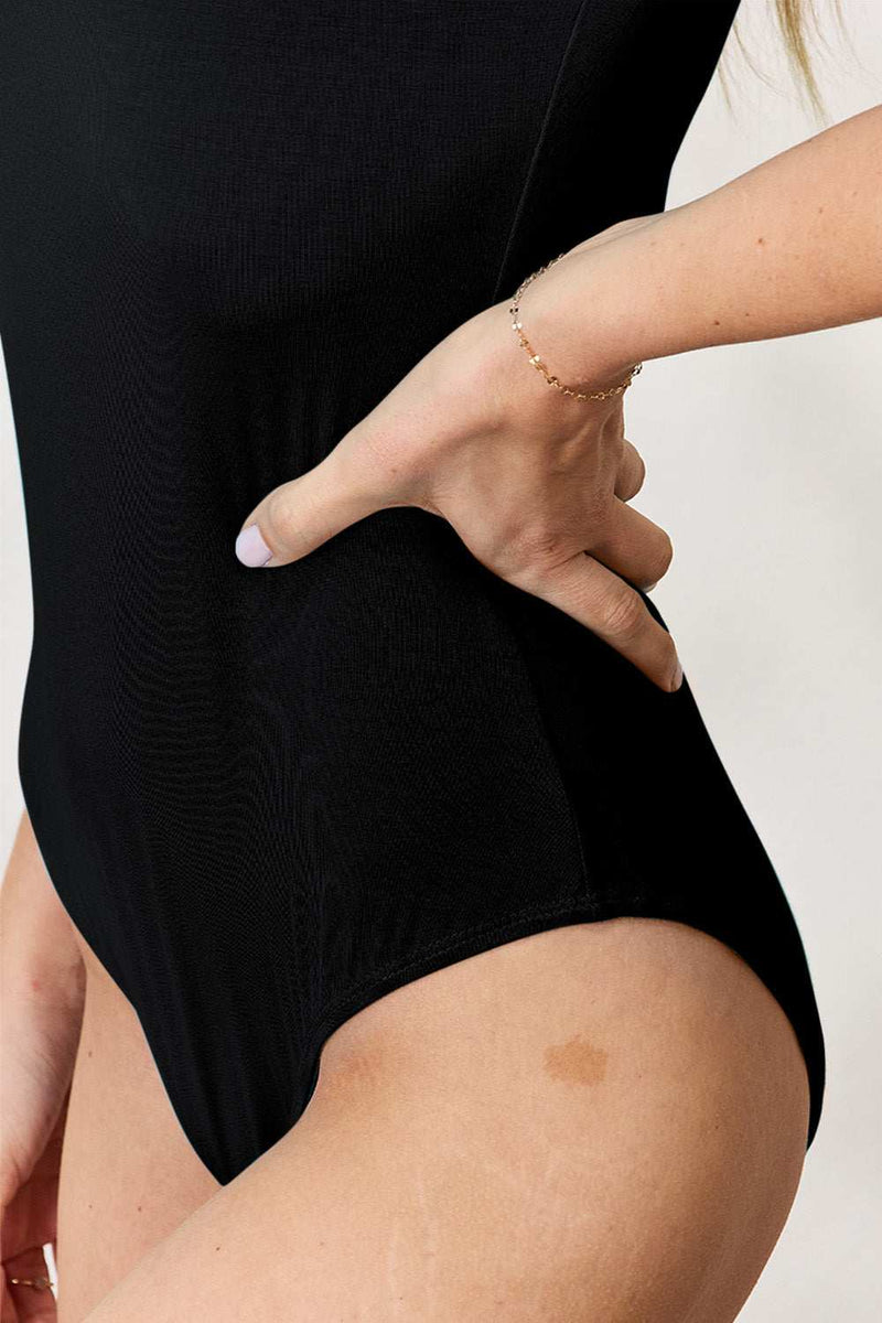 Basic Bae full size round neck short sleeve bodysuit in black, close-up.