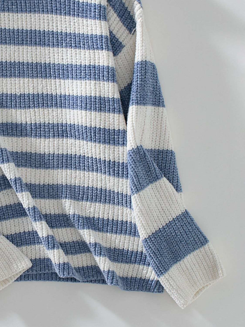 Striped round neck long sleeve sweater in blue and white.
