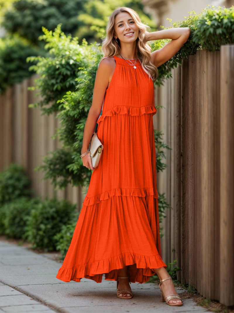 Ruffled sleeveless tiered maxi dress with pockets in orange.