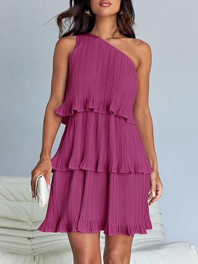 Layered single shoulder mini dress with ruffled design in magenta, featuring a slightly stretchy, opaque polyester fabric.