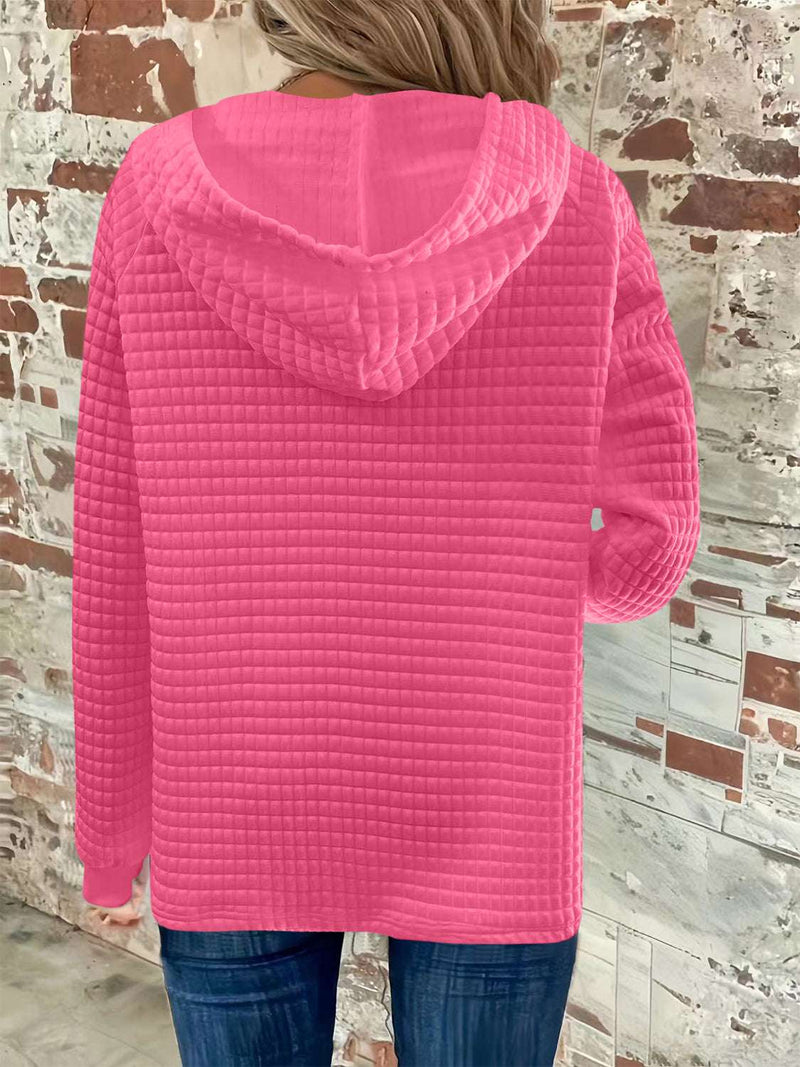 Full size pink textured long sleeve hoodie with button detail and drawstring.