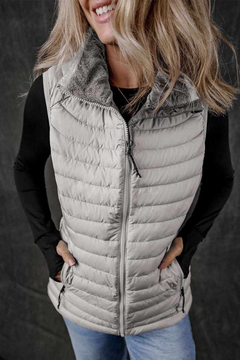 Black Plush Collared Quilted Zipped Puffer VestIntroducing our Black Plush Collared Quilted Zipped Puffer Vest - the perfect blend of comfort and chic! Designed for those who love to stay warm without compromisinOuterwear/VestsKlondike Creek Unique BoutiqueKlondike Creek Unique BoutiqueBlack Plush Collared Quilted Zipped Puffer Vest