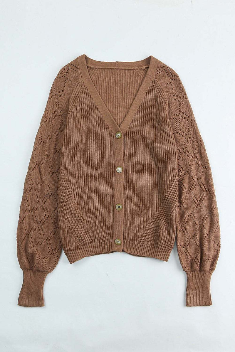 Openwork V-neck button-up cardigan made of 100% acrylic with a slightly stretchy fit.