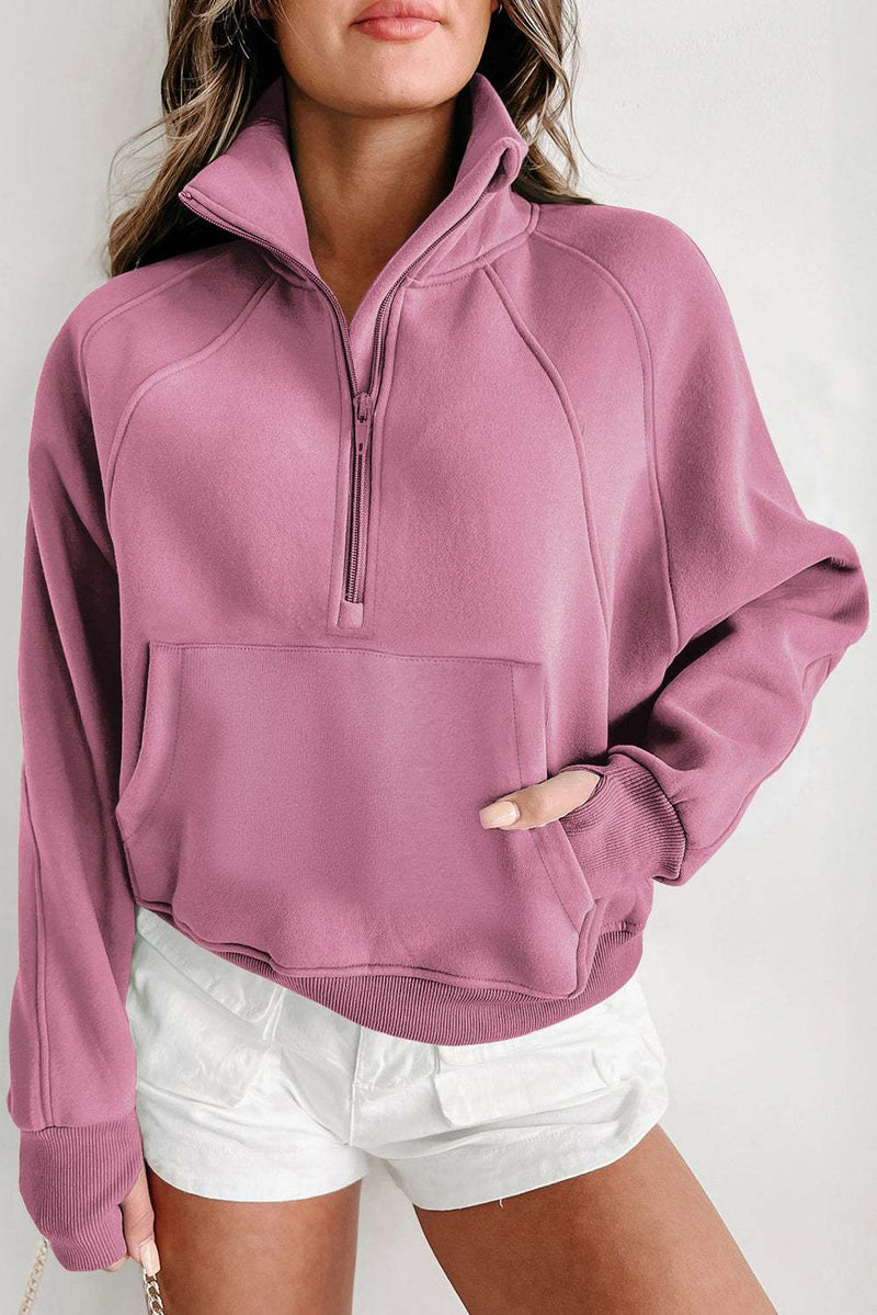 Fleece lined sweatshirt with stand collar and thumbhole sleeves in soft purple, perfect for winter warmth.