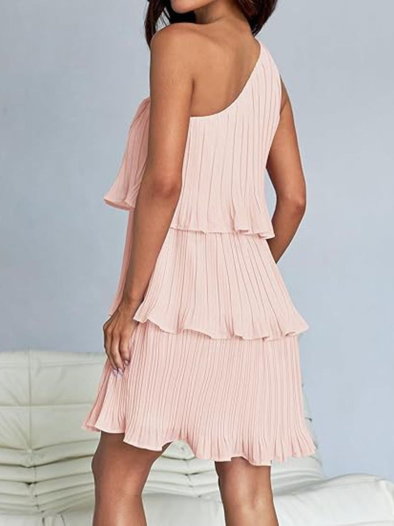 Layered single shoulder mini dress with ruffled tiers and slight stretch.