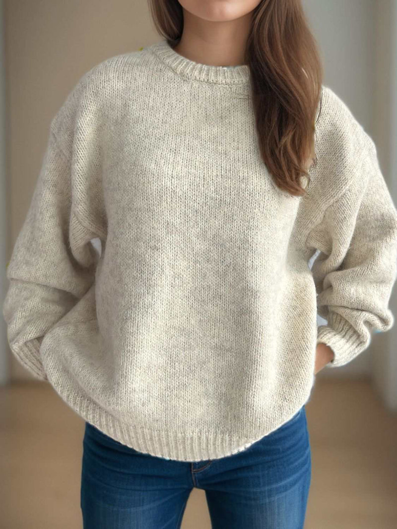 Round neck long sleeve sweater in light color, cozy and stylish.