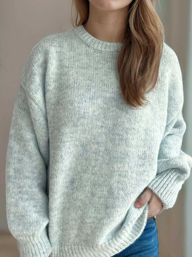 Round neck long sleeve sweater in light gray, cozy fabric.