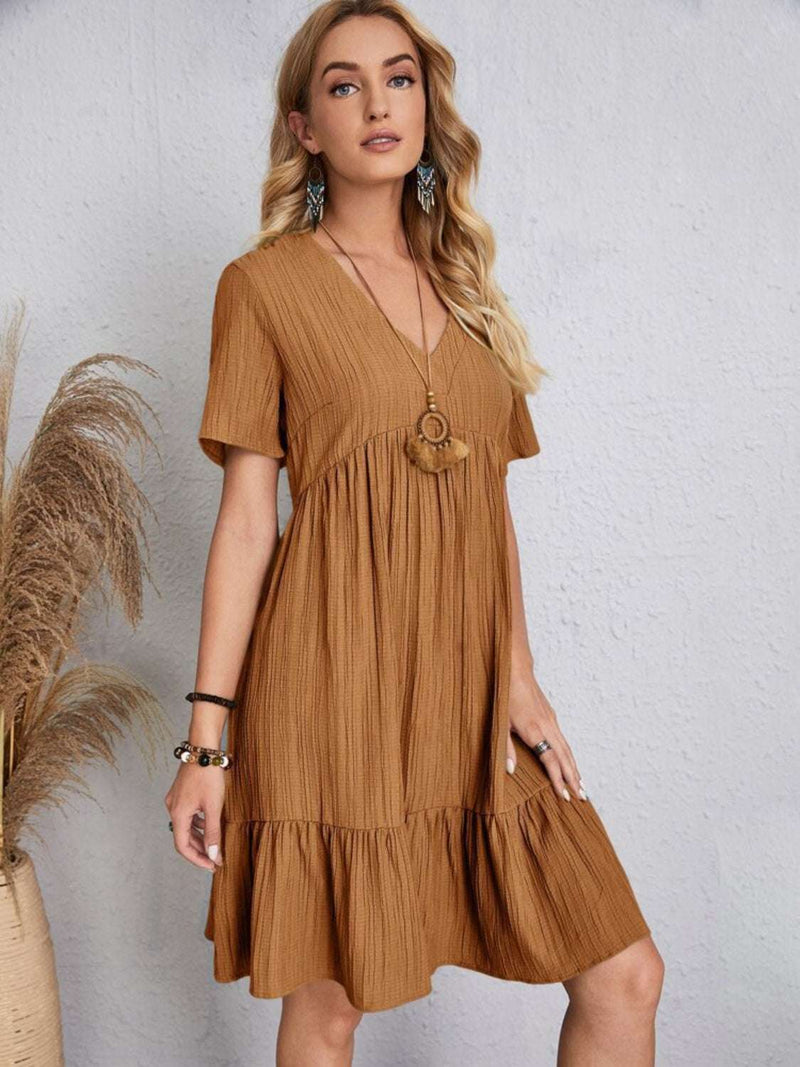 Full-size V-neck short sleeve dress in brown, featuring a basic style and opaque polyester fabric.