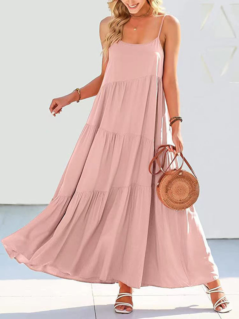Full size ruched tiered spaghetti strap dress in pink, flowing design.