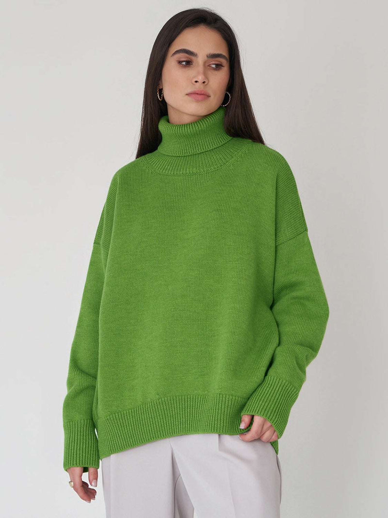 Green turtleneck long sleeve sweater, slightly stretchy, made of viscose, polyester, and nylon.