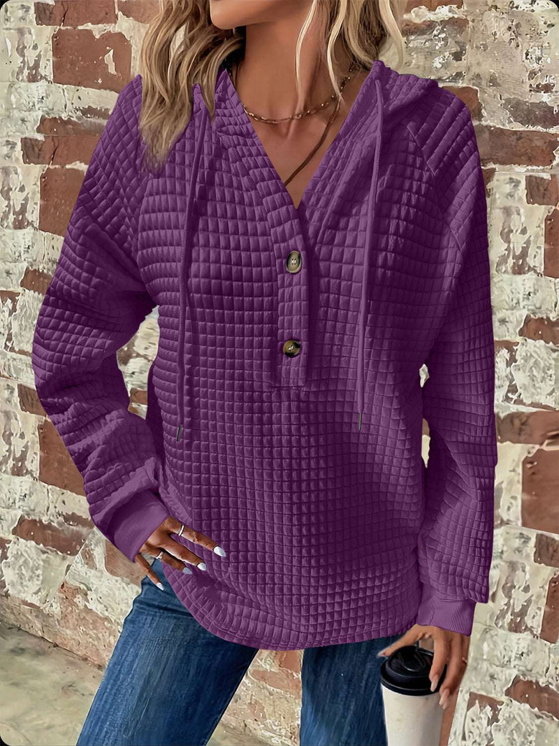 Full size purple texture drawstring hoodie with button detail and long sleeves.